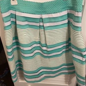 Teal and white striped short skirt.
